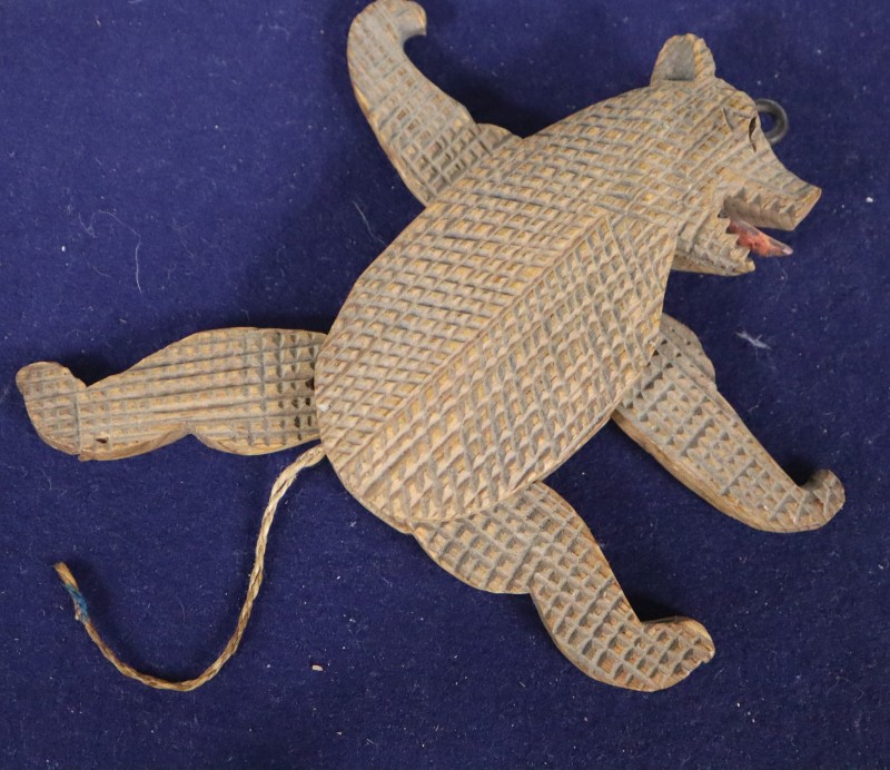 A Bavarian articulated carved wood climbing bear, with articulated limbs